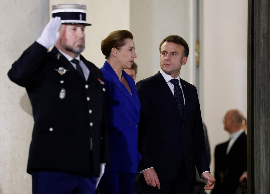 Denmark's prime minister Mette Frederiksen and French president Emmanuel Macron leaving an informal summit of European leaders in Paris to discuss the situation in Ukraine. Photograph: Ludovic Marin/AFP via Getty Images