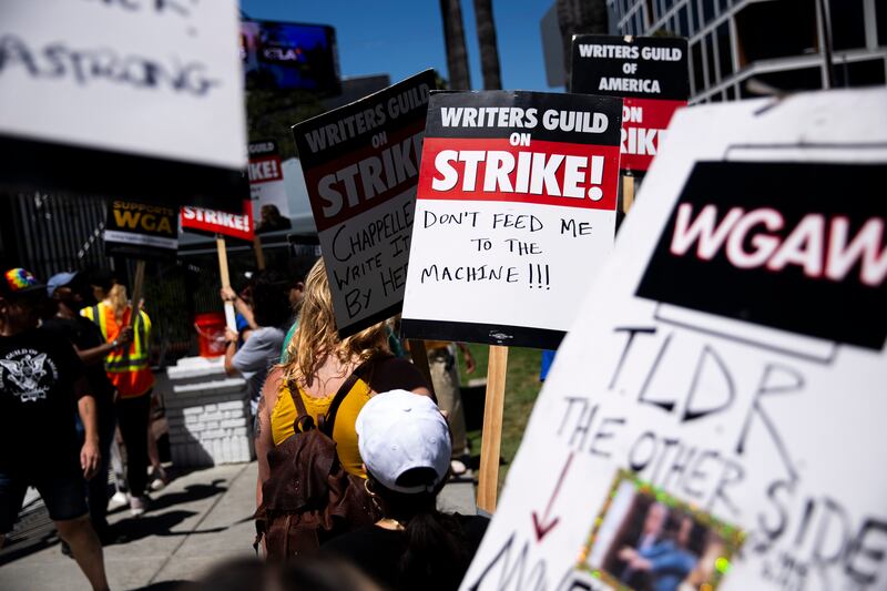 Members of the Writers Guild of America picket outside of Netflix's offices in LA. Photograph: Jenna Schoenefeld/The New York Times