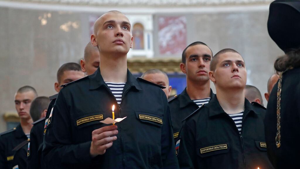 Navy sailors attend a memorial service at Kronshtadt Navy Cathedral for 14 sailors who died in the Barents Sea in Kronshtadt, outside St Petersburg. Photograph: Anatoly Maltsev/EPA