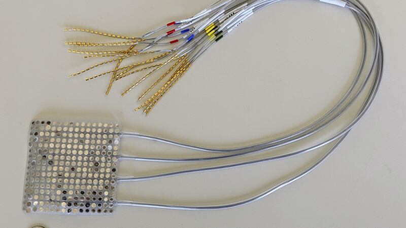 In a photo from the University of California, San Francisco, the ECoG Electrode Array. The array is made up of intracranial electrodes that record brain activity.