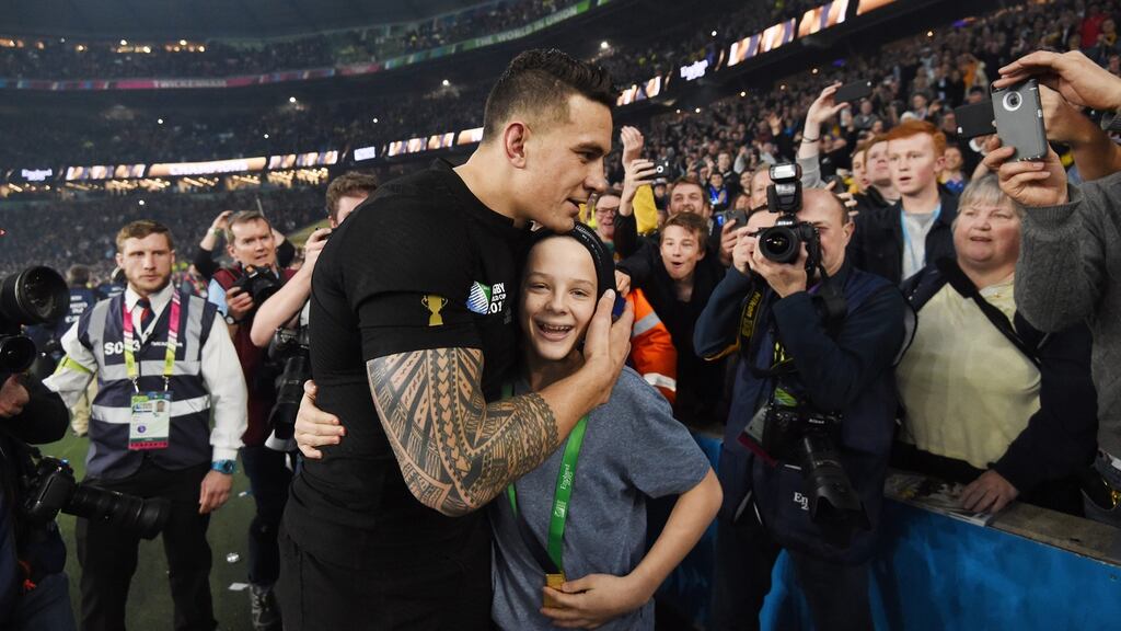 New Zealand supporter Charlie Lines reacts after All Blacks player Sonny Bill Williams gave him his gold medal after winning the Rugby World Cup 2015 Final. Photograph: EPA