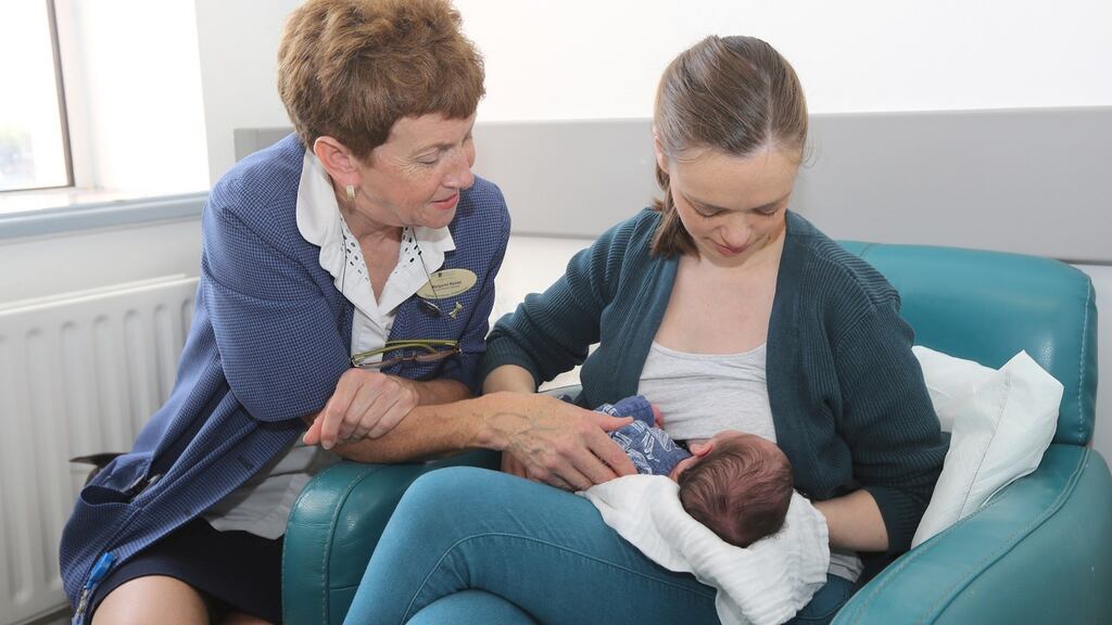 Lactation consultant Margaret Hynes with Kate Hickey and her three-week-old son Dean, at Limerick University Maternity Hospital. Photograph: Liam Burke/Press 22