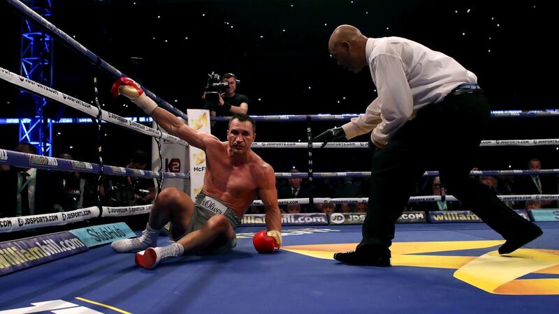 Referee David Fields counts Wladimir Klitschko down during the IBF, WBA and IBO Heavyweight World Title bout against Anthony Joshua at Wembley Stadium in London. Photograph: Nick Potts/PA Wire