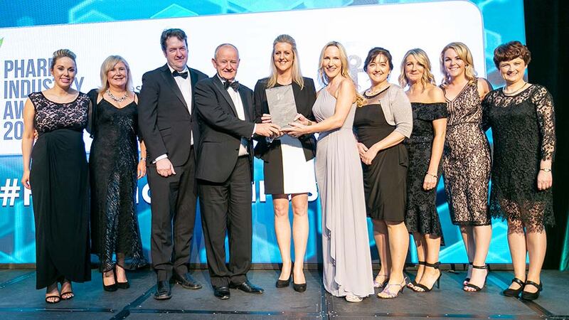 Pamela Quinn, MD, Kuehne + Nagel Ireland presents the Pharma Industry Company of the Year award to the Chanelle Pharma team.