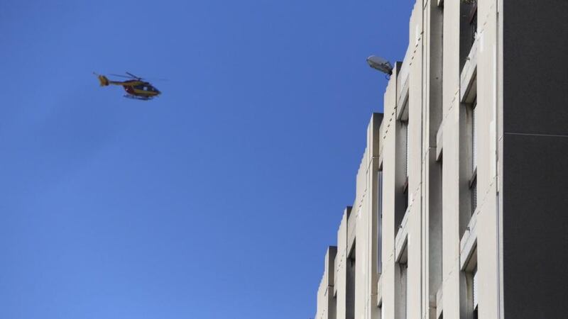 A helicopter flies over the ‘Cite de la Castellane’ in northern Marseille on Monday. Photograph: EPA