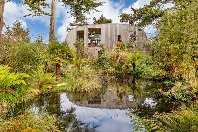 Pond in front of house