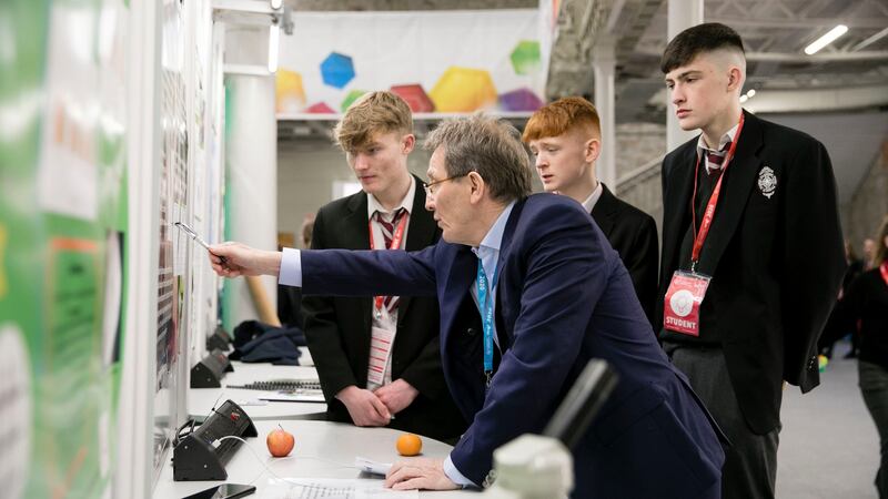 Niall Skehan, Luke Skehan and Darragh McMorrow from CBS Secondary School Kilkenny being judged on their project: The correlation between memory and the senses. Photograph: Chris Bellew/Fennell Photography