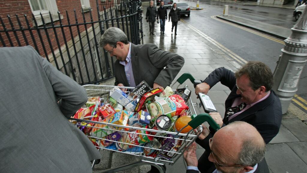 Members take a trolley of food back into the Merrion Hotel after the launch in Dublin in 2009 of the Love Irish Food organisation, established to promote Irish food and drink brands to consumers. Photograph: Frank Miller