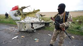 Possible missile parts found at MH17 crash site in Ukraine