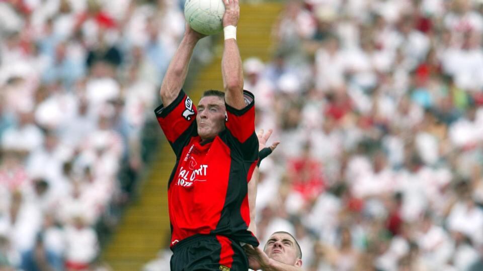 Liam Doyle and Philip Jordan of Tyrone in Ulster championship 2003. Photograph: Andrew Paton/Inpho