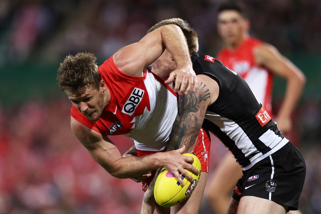 Luke Parker of the Sydney wans is tackled during the AFL Second Preliminary match. Photograph: Matt King/AFL Photos/via Getty