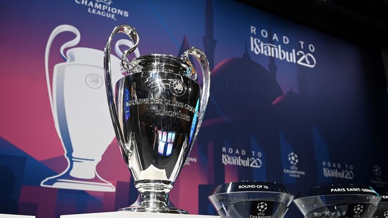 The Champions League trophy at the round of 16 draw in Nyon. Photograph: Getty Images)