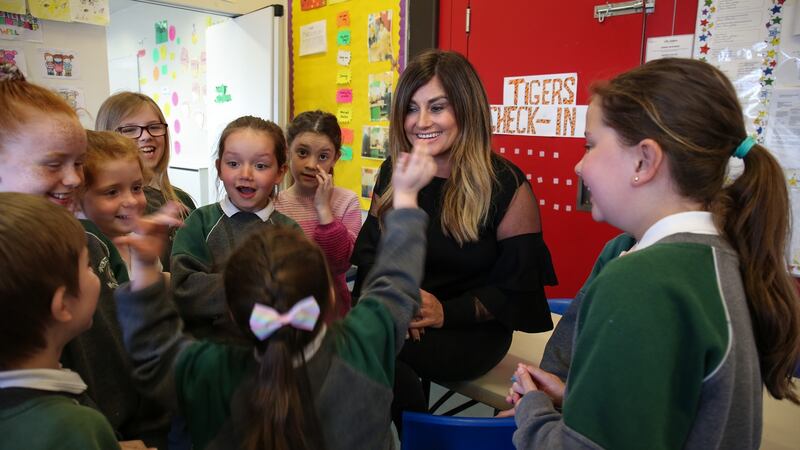 Karen Clince, managing director of Tiger Childcare with after school children at St Patrick’s N.S., Diswellstown, Castleknock
