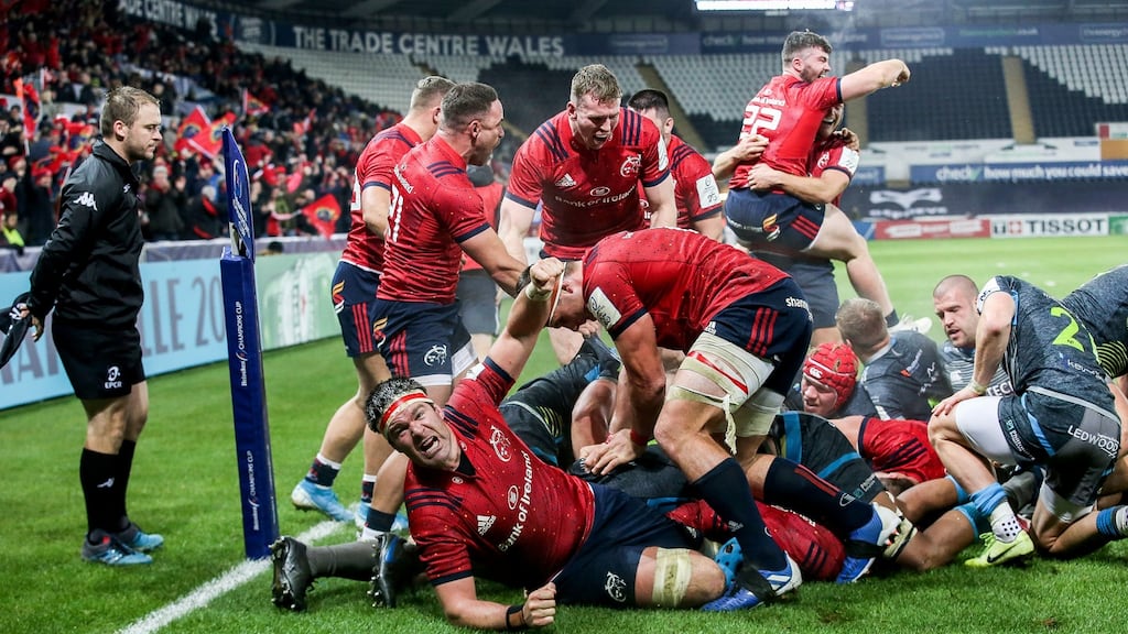 Munster celebrate James Cronin’s try to secure a bonus-point win over Ospreys at the Liberty stadium in Swansea. Photograph: Gary Carr/Inpho