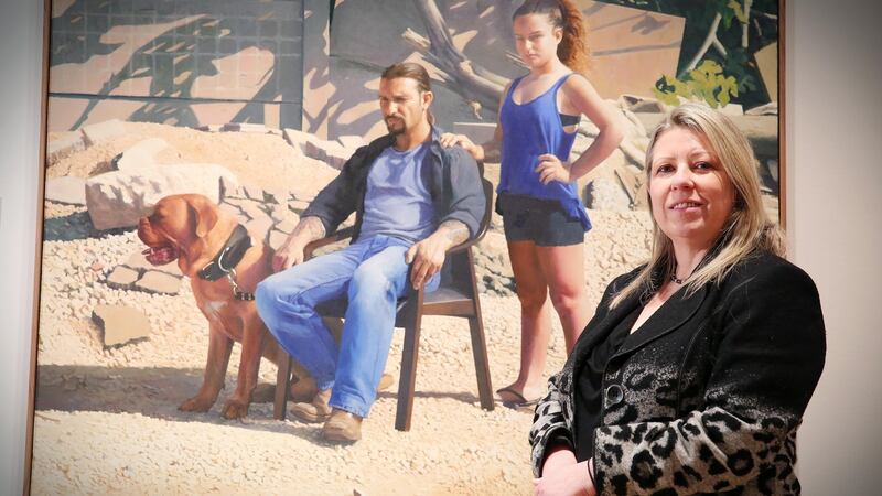 Kim Mawhinney, head of art at the National Museums Northern Ireland, is pictured with the 2015 winning BP Portrait Award entry, ‘Annabelle and Guy’, by artist Matan Ben-Cnaan. Photograph: Kelvin Boyes/Press Eye.