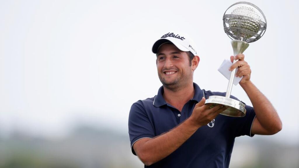 Alexander Levy of France poses with the trophy after winning the Portugal Masters at the Oceanico Victoria Golf Course in Albufeira, Portugal. Photograph: Dean Mouhtaropoulos/Getty Images