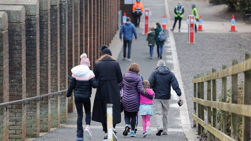Parents bringing children in the 5-11 age category to be vaccinated. Photograph: Alan Betson