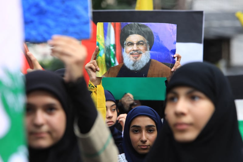 Hizbullah supporters hold up a portrait of the Lebanese militant movement's leader Hassan Nasrallah during a rally in the southern suburbs of Beirut on Sunday last. Photograph: AFP via Getty Images