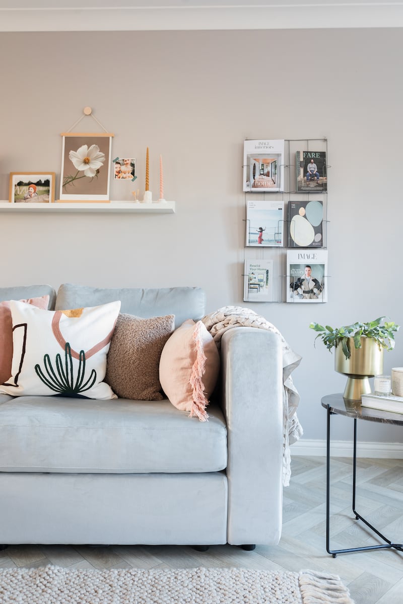 Nathalie Marquez Courtney found ways to inject colour without painting the walls through accessories, wall art, plants and soft furnishings