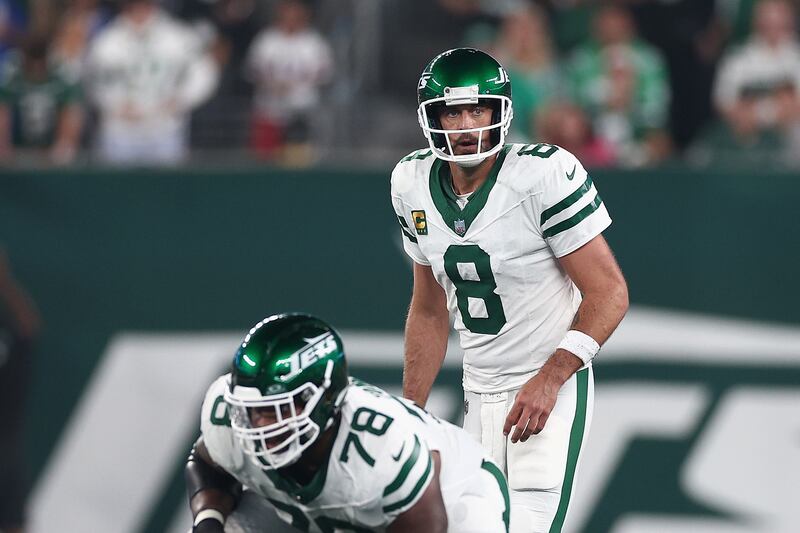New York Jets quarterback Aaron Rodgers prepares to snap the football during the first quarter of the NFL game against the Buffalo Bills on September 11th, 2023. Photograph: Elsa/Getty