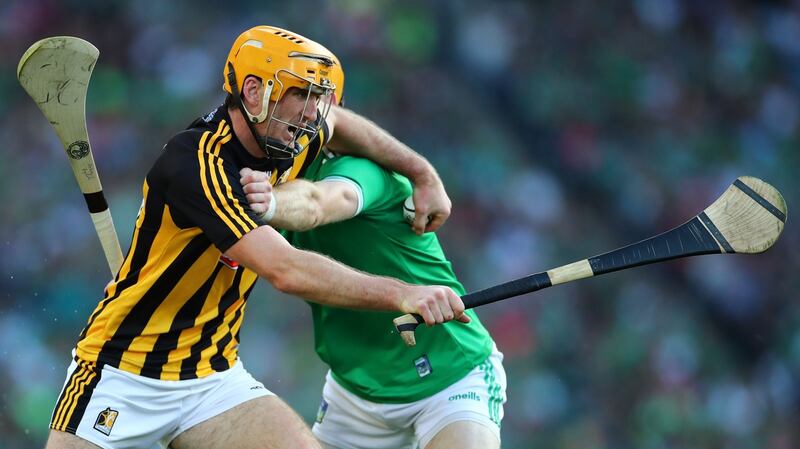 Kilkenny’s Colin Fennelly and Richie English of Limerick in the GAA Hurling All-Ireland Senior Championship semi final. Photograph: James Crombie/Inpho