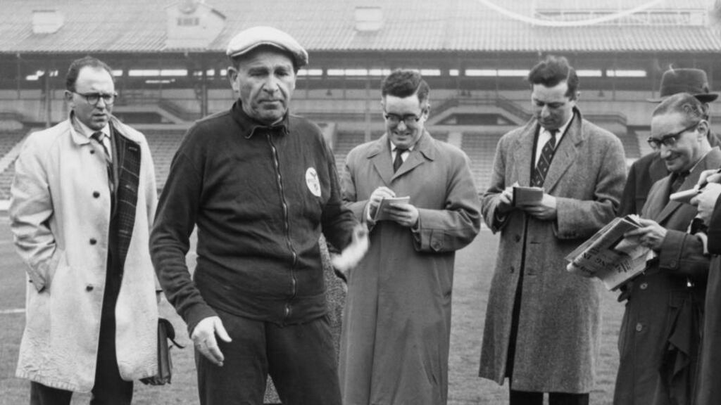 Béla Guttmann: the flawed, uniquely gifted Benfica coach – shown with journalists in London in 1962 – negotiated a path through the horrors of Nazism. Photograph: Keystone/Hulton/Getty