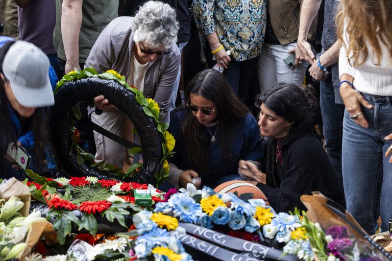 Family members and friends mourn during the funeral of Alon Shamriz in Shefayim, Israel, on December 17th. Photograph: EPA-EFE