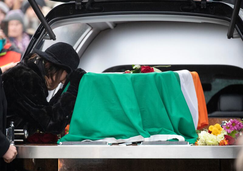 Shane MacGowan's wife, Victoria Mary Clarke, with his remains at the church. Photograph: Colin Keegan, Collins