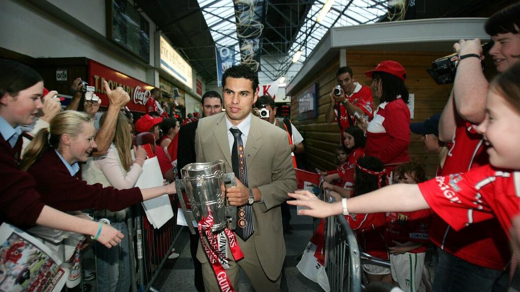 Seán Óg Ó hAilpín bringing the Liam MacCarthy Cup back to Cork. “I went from Seán Óg – ‘oh, isn’t the mother from somewhere exotic?’ – to Seán Óg ‘oh yeah, he lives in Park Dale’ and I became one of the community. That’s what the GAA did for us.”  Photograph: Eric Luke