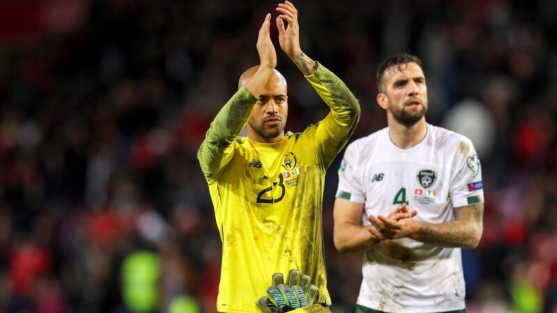 Ireland goalkeeper Darren Randolph applauds the travelling Irish support after the defeat to Switzerland in Geneva. photograph: Ryan Byrne/Inpho