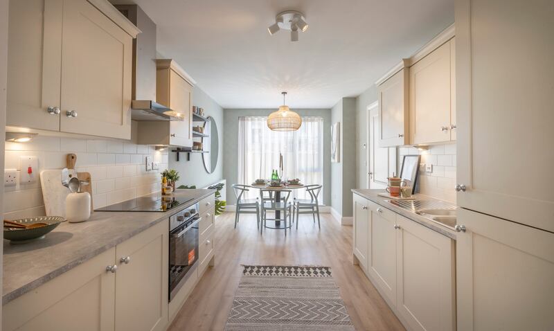 The Laurence layout has the kitchen at its centre