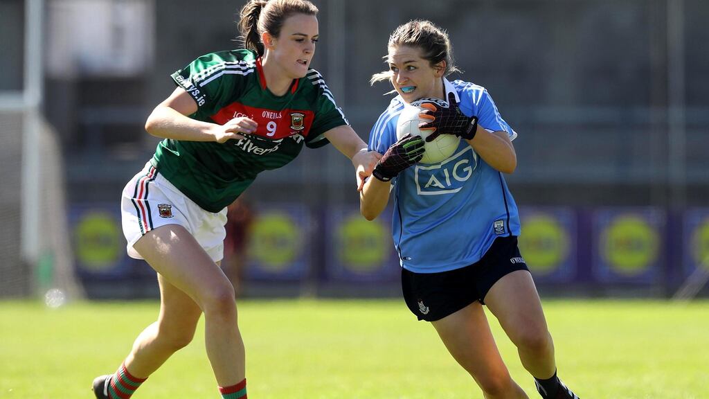 Dublin’s Martha Byrne is tackled by Mayo’s Clodagh McManamon. She says of final opponents Cork: “They took the game to a whole new level, so we have massive respect for them.”   Photograph: Lorraine O’Sullivan/Inpho