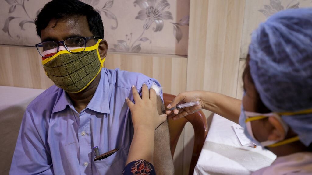 An Indian man receives a Covid-19 vaccine shot, inside a modified vaccination centre at Press Club in Kolkata, Eastern India, May 19th 2021. Photograph: Piyal Ashikary/EPA