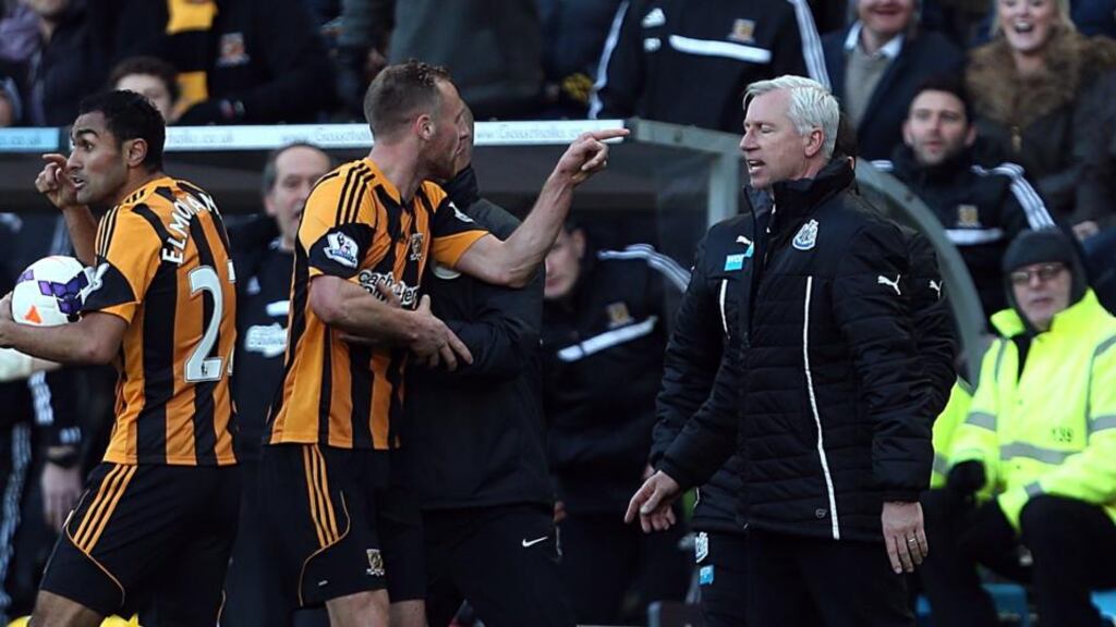 Newcastle United’s manager Alan Pardew and Hull City’s David Meyler  confront each other during the match at the KC Stadium.  Photograph: Lynne Cameron/PA Wire.