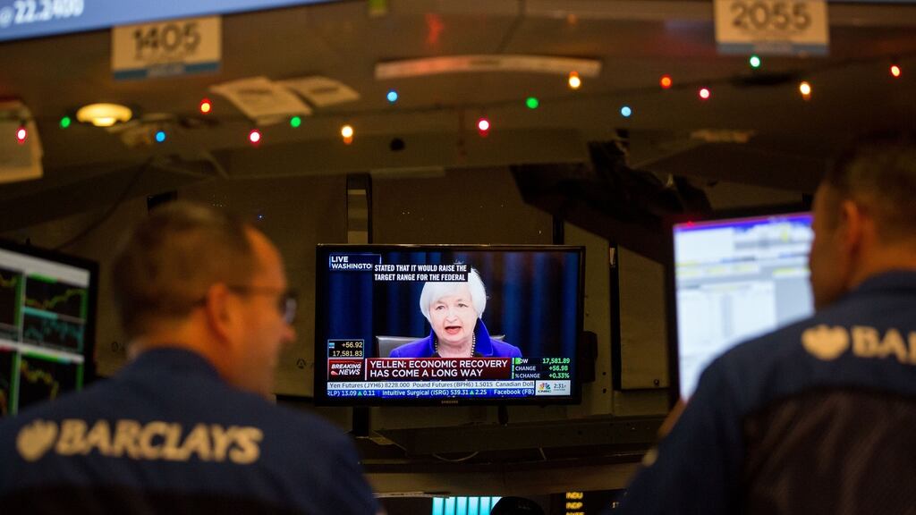 Traders on Wall Street. Seven years of near-zero interest rates have hurt Americans looking to put money aside for retirement but helped the wealthiest by propping up share prices and other assets. Photograph: Bloomberg