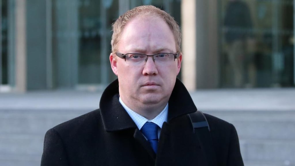Lorcan McCloskey leaving the the Circuit Criminal Court yesterday: said Michael O’Sullivan called him to return to Anglo’s office and effect a €20m transfer to cover Seán Quinn’s margin calls. Photograph: Niall Carson/PA Wire