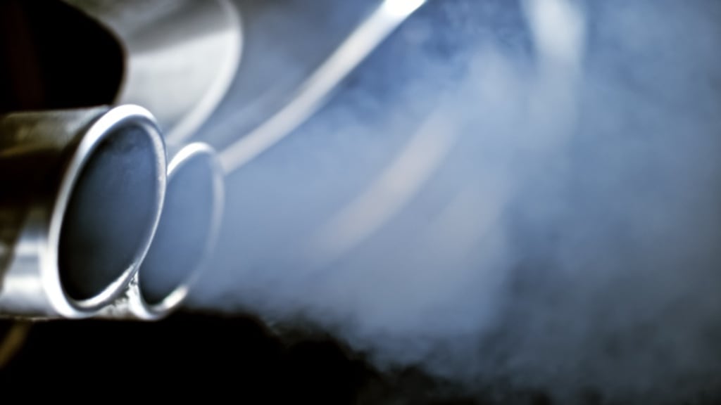 Emission from exhaust pipe of car. Photograph: iStock