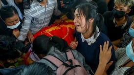 Mass funerals held in Myanmar as coup death toll revised up to 149