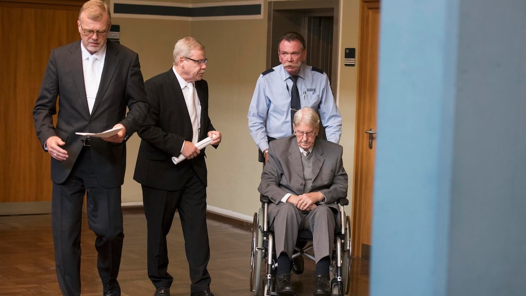 Reinhold Hanning, a 94-year-old former guard at the Auschwitz death camp, arrives in a courtroom in Detmold, Germany, where he was convicted over his role in the murder of 170,00 people at the death camp. Photograph: Bernd Thissen/Pool/Reuters.
