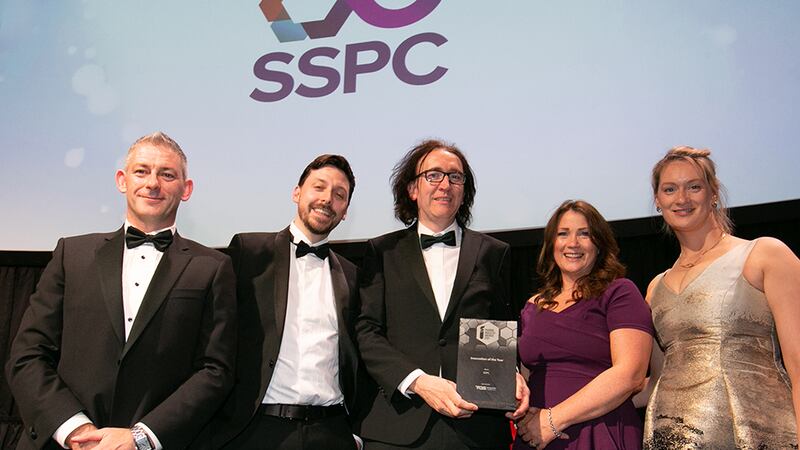 Alan Bourke, Global Head of Business Development, TQS Integration, A Cognizant Company, presents the Innovation of the Year award to the SSPC team.