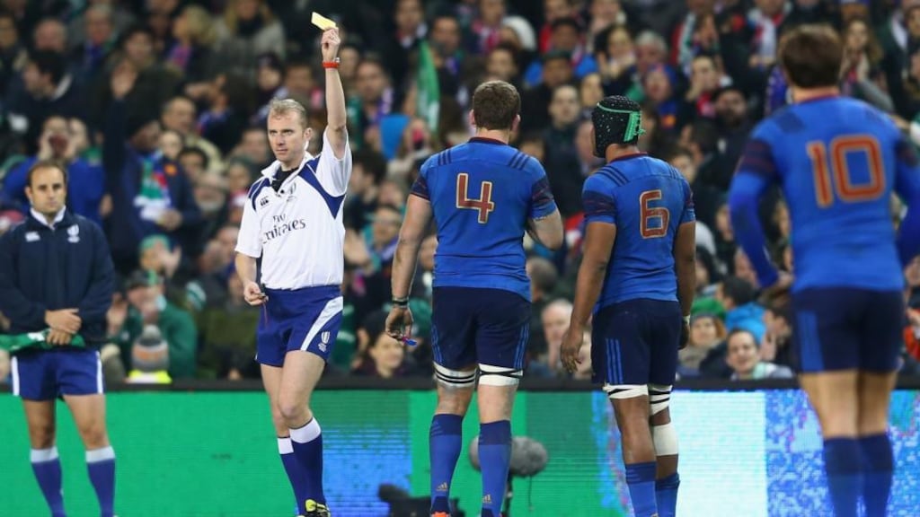 Pascal Pape (No 4) of France receives a yellow card from referee Wayne Barnes for kneeing Ireland’s Jamie Heaslip in the back during the Six Nations match at the Aviva Stadium in Dublin. Photograph: Michael Steele/Getty Images