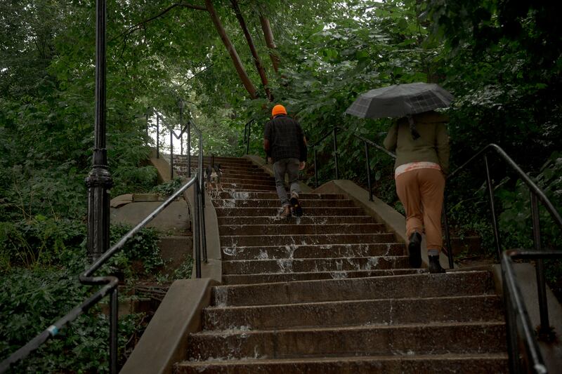Water rushes down a flight of stairs at the entrance to Mount Prospect Park in the Crown Heights neighbourhood of Brooklyn. Photograph: Anna Watts/New York Times