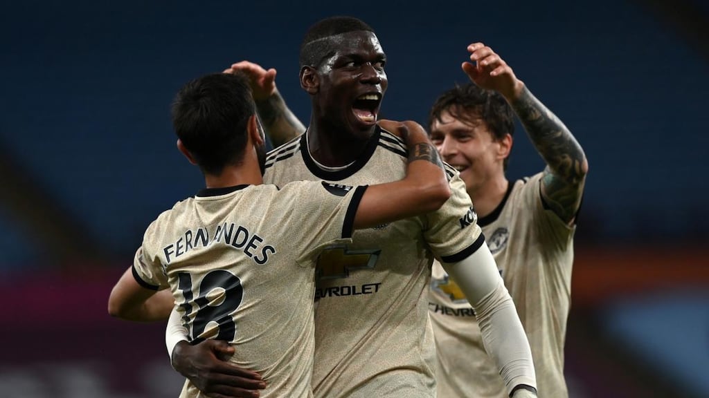 Paul Pogba celebrates scoring Manchester United’s third goal with Bruno Fernandes and Victor Lindelof during the Premier League match against Aston Villa at Villa Park. Photograph: Shaun Botterill/AFP via Getty Images