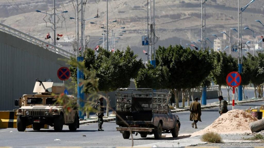 Presidential troops block a road leading to the presidential palace in Sanaa. Photograph: Khaled Abdullah/Reuters