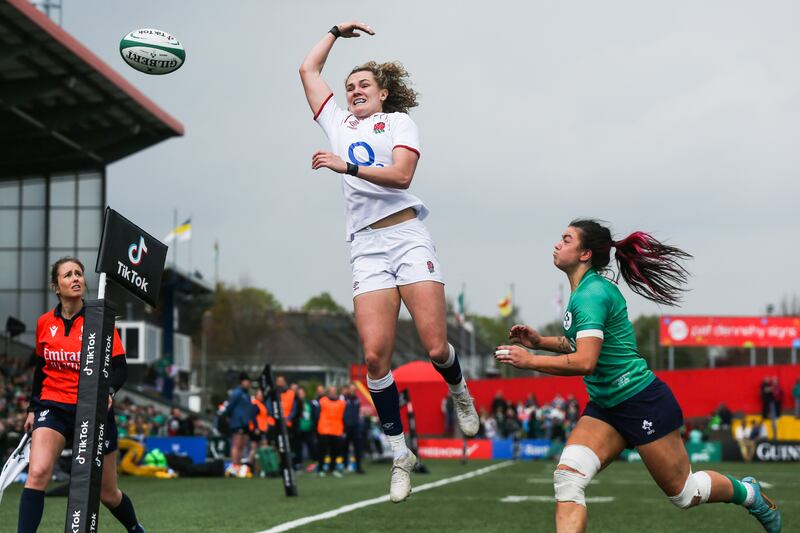 England's Ellie Kildunne tries to keep the ball in play ahead of Natasja Behan of Ireland at Musgrave Park. Photograph: Tom Maher/Inpho