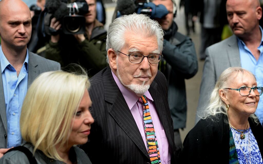 Veteran entertainer Rolf Harris arrives with daughter Bindi (left) and wife Alwen at Southwark Crown Court, London where he faces charges of alleged indecent assaults on under-age girls.Photograph: Anthony Devlin/PA Wire