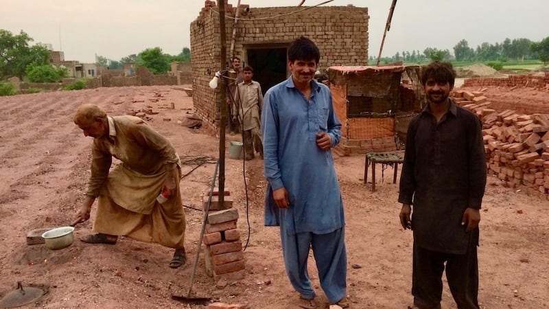 Brick kiln workers in the village of Mian Rashid, near Lahore. Photograph: Lorraine Mallinder