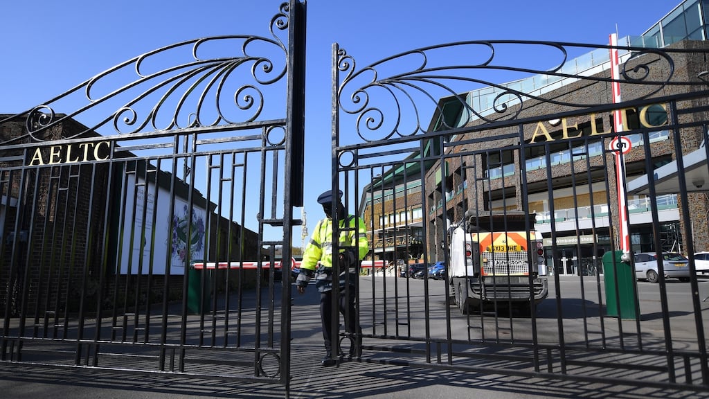 A security guard at the gates of the All England Lawn Tennis Club (AELTC) in Wimbledon, on Wednesday. Next year’s tournament is planned from June 28th-July 11th. Photograph: Andy Rain/EPA