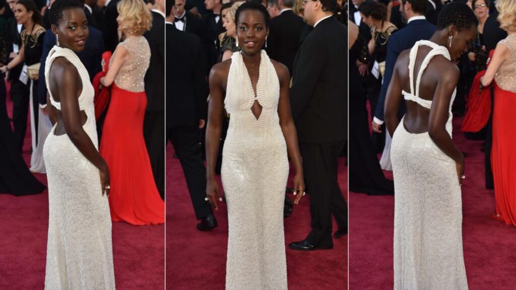 Actress Lupita Nyong’o poses on the red carpet in this combination image for the 87th Oscars. Photograph: AFP/Getty