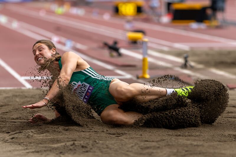Kate O’Connor lands after the jump. Photograph: Morgan Treacy/Inpho